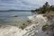 Wavy shoreline of Yellowstone Lake, with white limy beach, Wyoming.