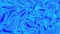 The wavy surface is blue. The blue surface shimmers in different shades. Abstract dynamic texture. 3d animation. Motion