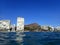 Wavy water on ocean off Kaimana Beach with hotels and condos