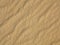 Wavy yellow sand texture background