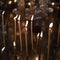 wax candles in the temple next to the cross, the front and back backgrounds are blurred with a bokeh effect