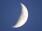 Waxing crescent moon phase in NYS evening sky