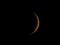 Waxing crescent moon seen with telescope