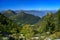 On the way to Monte Guglielmo. View to Corna Trentapassi and far to the Alps. Brescia, Lombardy, Italy