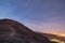 Waypath in the mountains near of Eilat city in the desert in the Israil in the evening with blue sky and city lights