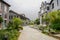 Wayside old-fashioned buildings in cloudy spring afternoon