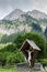 Wayside shrine in front of mountains