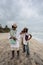 Wayuu familly posing on the beach in Colombia