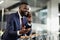 Wealthy african american entrepreneur having phone conversation