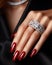 wealthy high society womans perfect manicured hand and finger nails