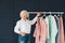 Wealthy senior lady wardrobe shopping leisure