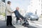 Wealthy senior man in wheelchair with wife retirement