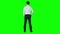 Wear view of businessman thinking on green screen