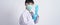 Wearing gloves. Asian doctor wear blue rubber nitrile hands glove