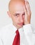 Weary businessman over grey background