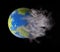 Weather blowing smoke on planet earth globe