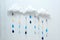 Weather symbols. Handmade room decoration clouds with rain drops