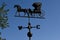 Weather vane featuring an Amish buggy and horse