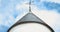 Weather vane on the roof top of a windmill on the island of Noirmoutier