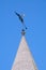 Weathercock with a flag on one of the tvelfth towers of Kamiane