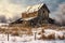 weathered barn in winter, covered in snow