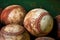 The weathered and coarse surface of antique baseballs on green background