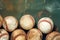 The weathered and coarse surface of antique baseballs on green background