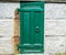 Weathered door to cemetery crypt