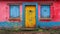 Weathered door and window in a colorful wall.