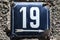 Weathered enameled plate number 19