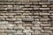 Weathered grey bricks wall