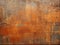 Weathered grunge rusty orange and textured metal background, highlighting the raw and industrial aspect of metal surfaces.