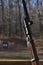 Weathered Mosin Nagant Wood Gun Rifle Stock with Bayonet Attached and Targets in the Background