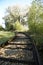 Weathered railway tracks leading into nowhere