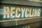 Weathered recycling sign