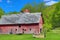 Weathered Red Barn and Silo Behind