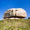 weathered rock at green moorland in Ploumanach