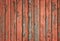 Weathered rustic red wood plank background