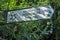 Weathered sign for Sandham Memorial Chapel, Burghclere, Hampshire