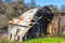 Weathered Storage Shed Falling Down