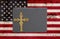 Weathered United States of America flag with a black chalkboard