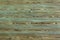 Weathered wood background with remnants of blue