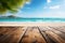 Weathered wood tabletop against a serene, blurred beach backdrop