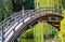 Weathered wooden curved bridge