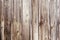 Weathered wooden fence texture with rusty nail heads