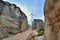 Weathering granite canyon and windmill