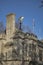 Weathervane in the form of a ship on a Victorian type building on the Thames waterfront