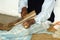 Weaver combing wool in Ecuador