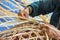 Weaving bamboo basket.