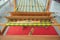 Weaving by hand loom, Weaving loom and shuttle on the warp